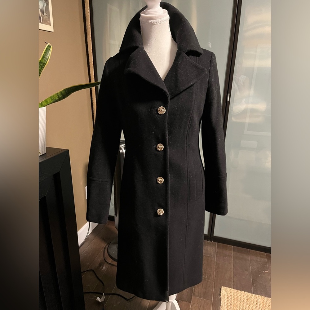 70% wool winter coat 
Black with gold buttons
Like new